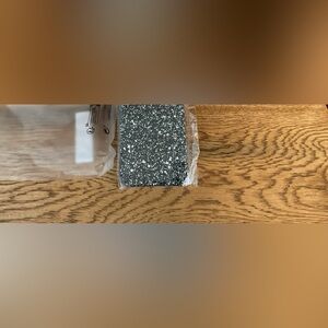 New in package I Phone 12 black and silver sparkle case